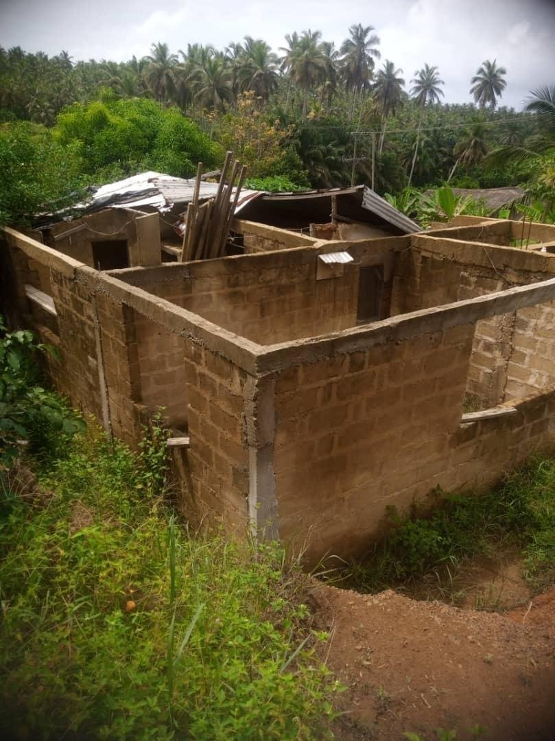 A plot of land with two bedrooms uncompleted building for sale